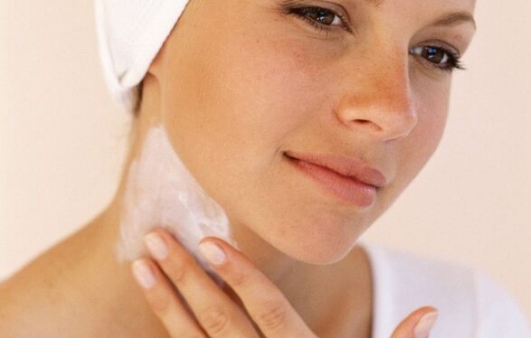 to apply a cream to rejuvenate the skin on the neck and throat